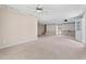 A finished basement provides a versatile living space with neutral carpet and ample natural light at 20 Jenmar Dr, Fuquay Varina, NC 27526