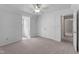 Spacious bedroom features neutral carpet, ceiling fan, and a large closet with double doors at 20 Jenmar Dr, Fuquay Varina, NC 27526