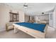 Spacious game room featuring a pool table and screen, perfect for entertaining guests at 20 Jenmar Dr, Fuquay Varina, NC 27526