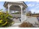 Beautiful gazebo in backyard with wooden deck and detailed woodwork at 20 Jenmar Dr, Fuquay Varina, NC 27526