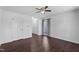 Spacious living room with hardwood floors, a ceiling fan, and neutral decor at 20 Jenmar Dr, Fuquay Varina, NC 27526