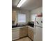 Another view of the kitchen featuring white appliances and ample counter space for meal preparation at 2002 Technology Woods Drive # 103, Raleigh, NC 27603