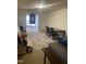 Spacious living room features a decorative rug and versatile layout for various furniture arrangements and activities at 2002 Technology Woods Drive # 103, Raleigh, NC 27603