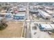 Aerial view showcasing downtown with buildings, streets, and surrounding areas at 202 W Hill St, Benson, NC 27504