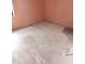 Bedroom with unfinished flooring, and walls painted in muted orange tone at 208 Essex Rd, Nashville, NC 27856