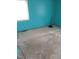 Bedroom with a window and unfinished flooring, featuring brightly painted walls at 208 Essex Rd, Nashville, NC 27856