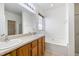 Spacious bathroom features double sinks, a soaking tub, and a bright window at 2344 Lazy River Dr, Raleigh, NC 27610
