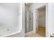Bathroom featuring a bathtub and shower combo, and a door to the closet at 2344 Lazy River Dr, Raleigh, NC 27610