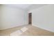Bright bedroom featuring neutral carpet, fresh paint, and natural light at 2344 Lazy River Dr, Raleigh, NC 27610