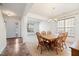 Inviting dining room with a wooden table, neutral carpet, and a chandelier at 2344 Lazy River Dr, Raleigh, NC 27610