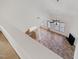 Aerial view of the open-concept living room, with a kitchen and fireplace at 2344 Lazy River Dr, Raleigh, NC 27610