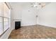 Bright living room with a fireplace and plenty of natural light from large window at 2344 Lazy River Dr, Raleigh, NC 27610