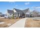 Beautiful clubhouse showcasing modern architectural design and professional landscaping at 2515 Maplemere Ct, Durham, NC 27703