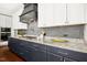 Contemporary kitchen boasts granite countertops, stainless steel appliances, and ample cabinet space at 2515 Maplemere Ct, Durham, NC 27703
