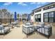 A community outdoor lounge area with seating and dining options at 2515 Maplemere Ct, Durham, NC 27703