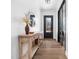Inviting foyer featuring a console table and a decorative mirror at 285 Scotland Dr, Youngsville, NC 27596