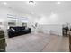 Open floor plan with neutral colors and lots of natural light at 285 Scotland Dr, Youngsville, NC 27596