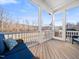 Inviting screened porch with comfortable seating and views of the tranquil backyard at 285 Scotland Dr, Youngsville, NC 27596