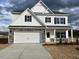 Charming two-story home with a two-car garage and neutral paint at 30 Olivia Crossing Ct, Smithfield, NC 27577