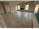 Spacious living room featuring an electric fireplace and two bright windows at 30 Olivia Crossing Ct, Smithfield, NC 27577