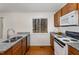The kitchen features granite countertops, a stainless steel sink, and modern appliances at 3011 Little Creek Ln, Hillsborough, NC 27278