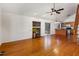 Bright living space with hardwood floors, fireplace, and open to the kitchen layout at 3011 Little Creek Ln, Hillsborough, NC 27278