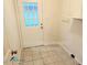 Mud Room featuring tile flooring, white door with window and some shelving at 3011 Little Creek Ln, Hillsborough, NC 27278