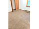 Bedroom featuring carpet, a window, and a closet at 323 Ranch Farm Rd, Raleigh, NC 27603