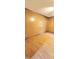 This living room features hardwood floors and wood paneling at 323 Ranch Farm Rd, Raleigh, NC 27603