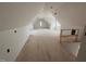Large unfinished attic space showing construction and natural light at 3321 Founding Place, Raleigh, NC 27612