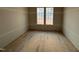 Bedroom under construction with window offering natural light and views at 3321 Founding Place, Raleigh, NC 27612