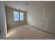 Unfinished bedroom showing two double hung windows and drywall walls at 3321 Founding Place, Raleigh, NC 27612