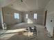Living room under construction featuring several windows at 3321 Founding Place, Raleigh, NC 27612