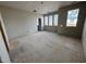Bright living room under construction featuring several windows offering natural light at 3321 Founding Place, Raleigh, NC 27612