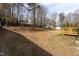 Large, well-maintained backyard featuring a wooden deck, perfect for outdoor entertaining and relaxation at 3528 Dewing Dr, Raleigh, NC 27616