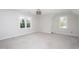 Spacious bedroom featuring carpet, neutral paint, closet and a modern light fixture at 3528 Dewing Dr, Raleigh, NC 27616