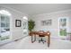 Bright home office featuring wainscoting, and three windows at 3528 Dewing Dr, Raleigh, NC 27616