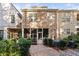 Exterior view of home showcasing the backyard, screened-in porch, and patio at 357 Roberts Ridge Dr, Cary, NC 27513