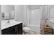 Well-lit bathroom featuring a combined shower and tub, and neutral color palette at 357 Roberts Ridge Dr, Cary, NC 27513