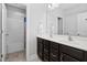 Bathroom with double vanity sinks, granite countertops, and a shower/tub combo at 357 Roberts Ridge Dr, Cary, NC 27513