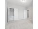 Bright bedroom featuring a closet with drawers and neutral carpet at 357 Roberts Ridge Dr, Cary, NC 27513