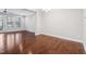 Sunny dining room offers wood floors and access to the patio through large glass doors at 357 Roberts Ridge Dr, Cary, NC 27513