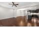 Spacious living room with hardwood floors adjacent to the kitchen, offering ample space for entertaining at 357 Roberts Ridge Dr, Cary, NC 27513