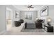 Stylishly staged main bedroom with sitting area and ensuite bath for ultimate relaxation at 357 Roberts Ridge Dr, Cary, NC 27513