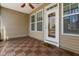 Cozy porch with wood-look tile and access to the outdoors at 357 Roberts Ridge Dr, Cary, NC 27513