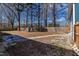 Large, fenced backyard with a paved patio area, perfect for outdoor gatherings or enjoying the peaceful surroundings at 388 Holland Dr, Smithfield, NC 27577