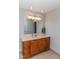 Bathroom featuring a wooden vanity with marble countertop, offering ample storage at 388 Holland Dr, Smithfield, NC 27577