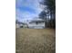 Charming single-story home with a quaint front porch and lawn at 4805 Barbee Rd, Durham, NC 27713