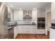 Well-equipped kitchen with stainless steel appliances, a contemporary design, and ample storage at 4812 Stonehill Dr, Raleigh, NC 27609