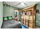 bedroom features wooden playhouse bed frame, overhead fan and plush carpet at 4901 North Pointe, Sanford, NC 27332